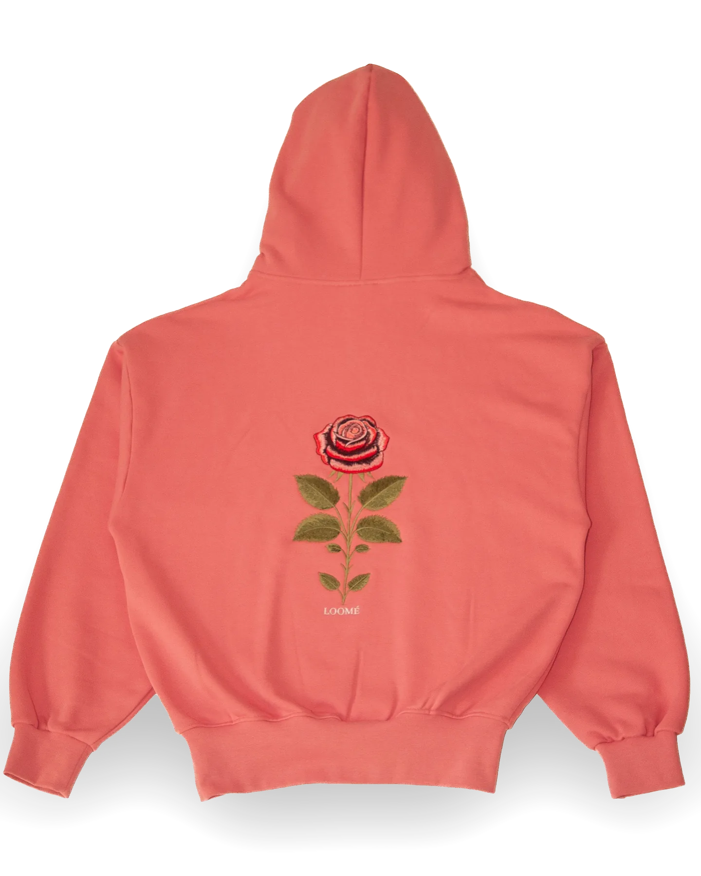 Nahaufnahme der Rückseite von Work 01 in Bubblegum Pink (Rosa): die gestickte Rose zwischen den Schulterblättern, LOOMÉ unter dem Stiel.