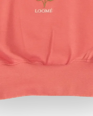 Nahaufnahme des Saums von Work 01 in Bubblegum Pink (Rosa): Der weite Körper wird von einem tiefen Rippenbund gerafft.